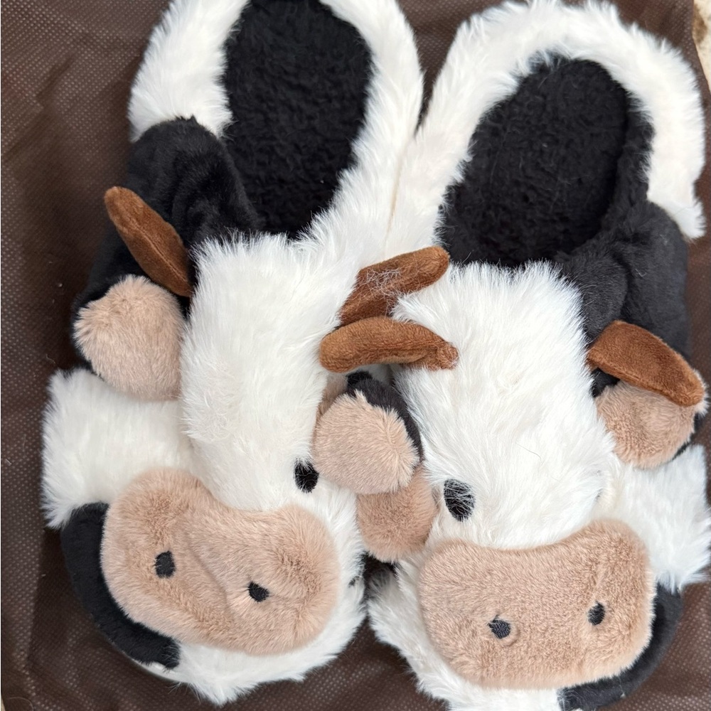 Brand new!
Original packaging 
Slippers
Cows